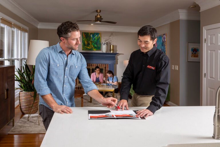 Thornton Employee consulting with homeowner